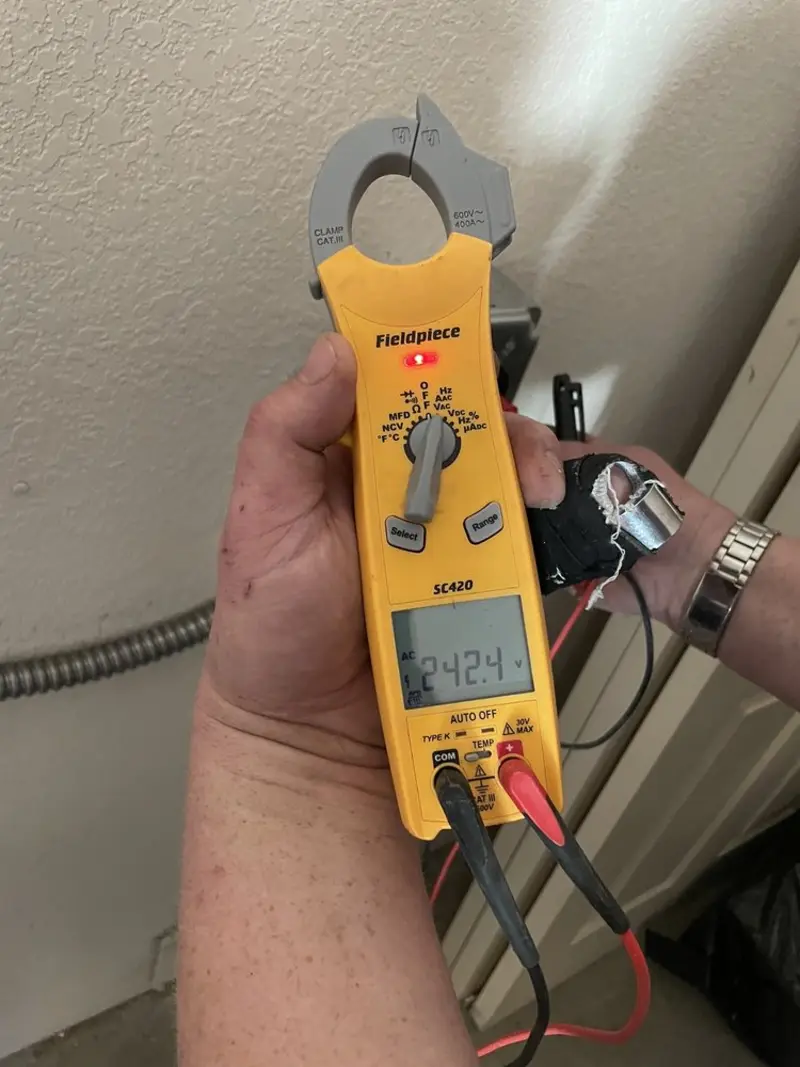Voltage testing with clamp meter during Outlet Installation in Grand Rapids